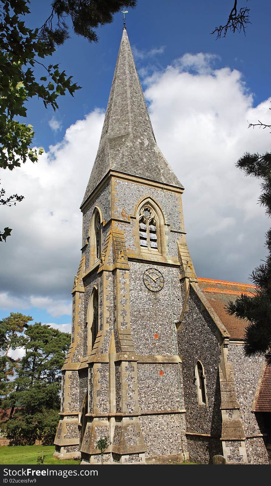 English Village Church ans Steeple with Clock. English Village Church ans Steeple with Clock