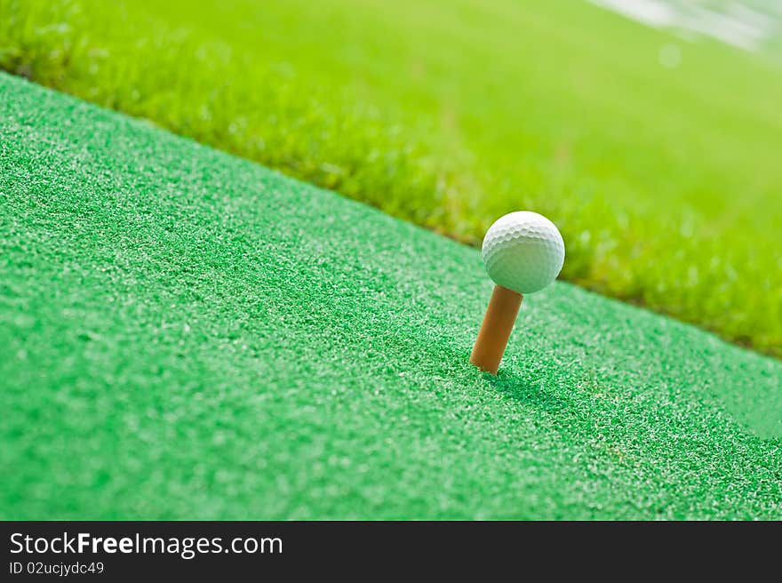 Golf in green grass background. Golf in green grass background.