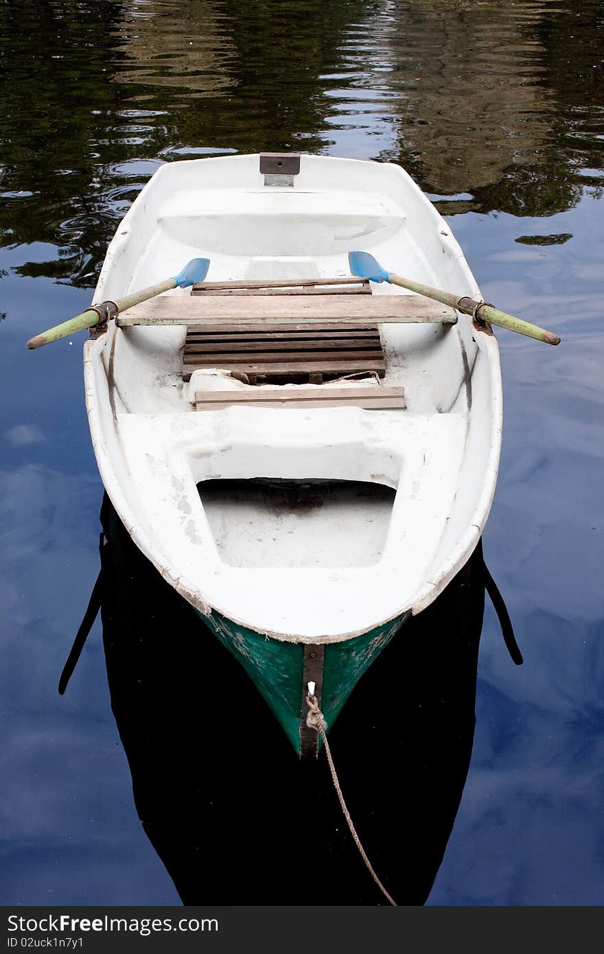 Green boats on the water. Green boats on the water