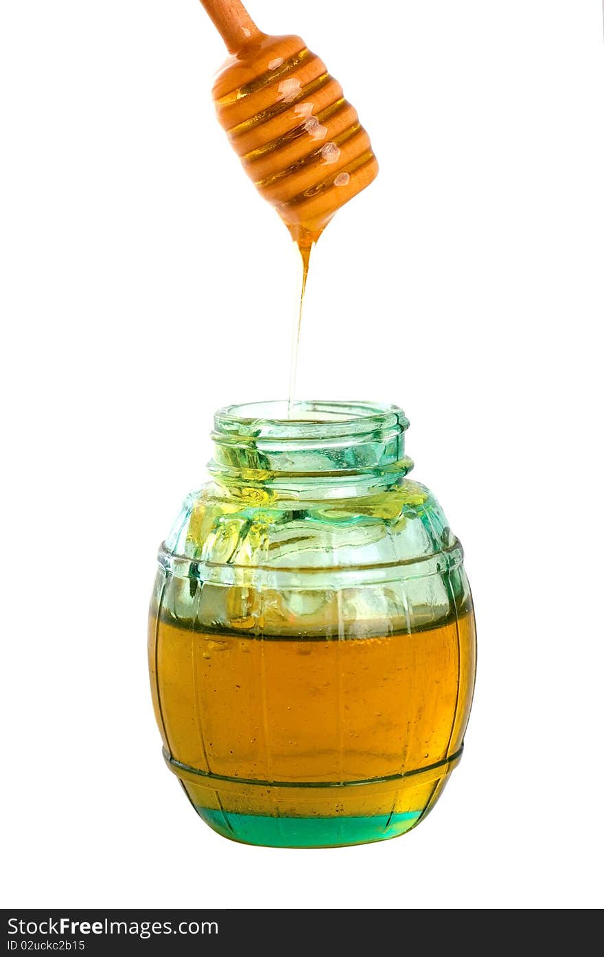 Jar of honey and honey stick. Jar of honey and honey stick
