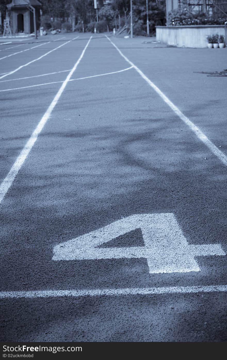 Running track lines in sunshine.