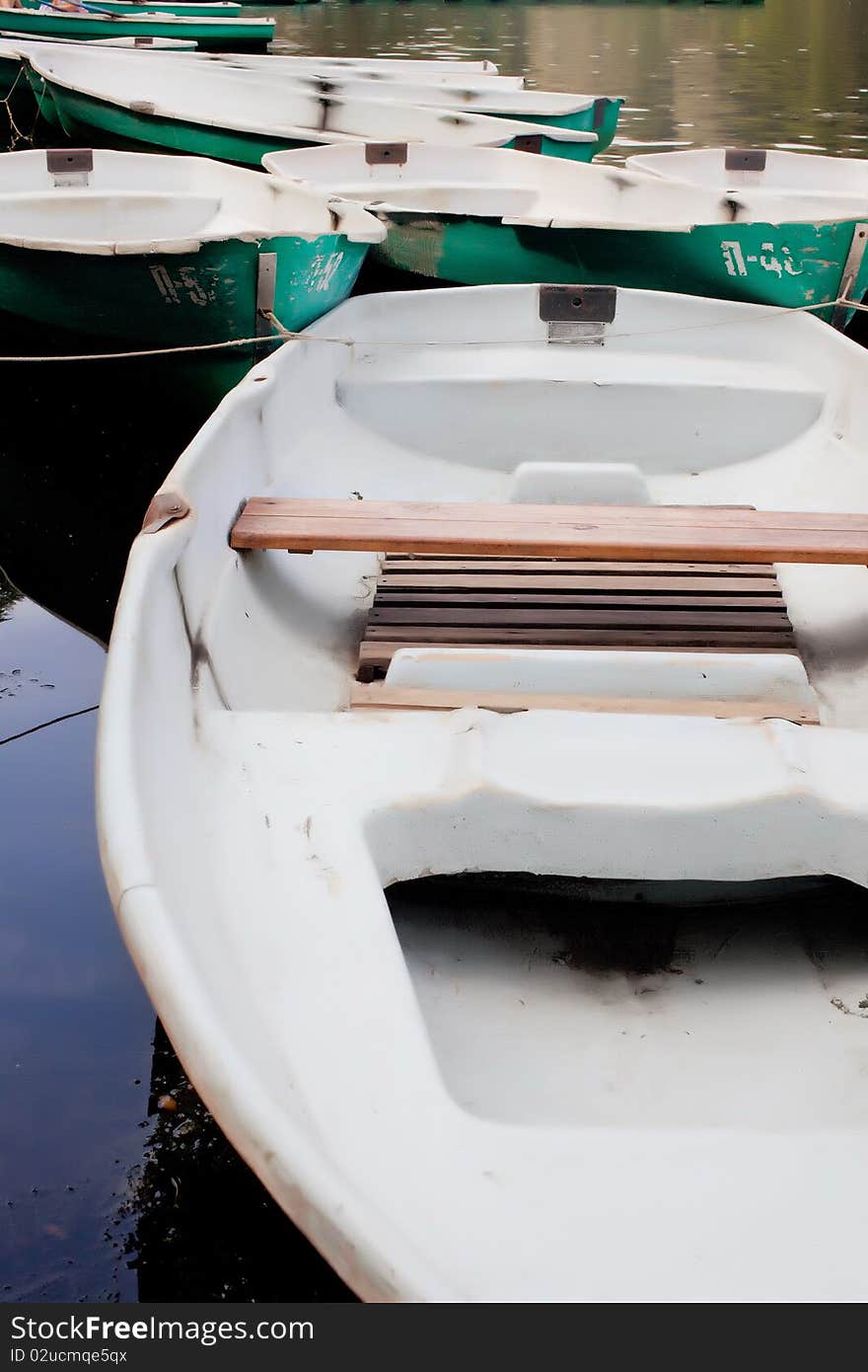 Green boats on the water. Green boats on the water