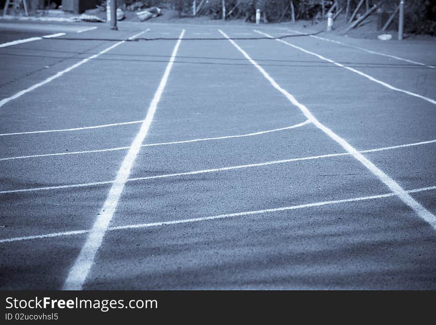 Running track lines in sunshine.