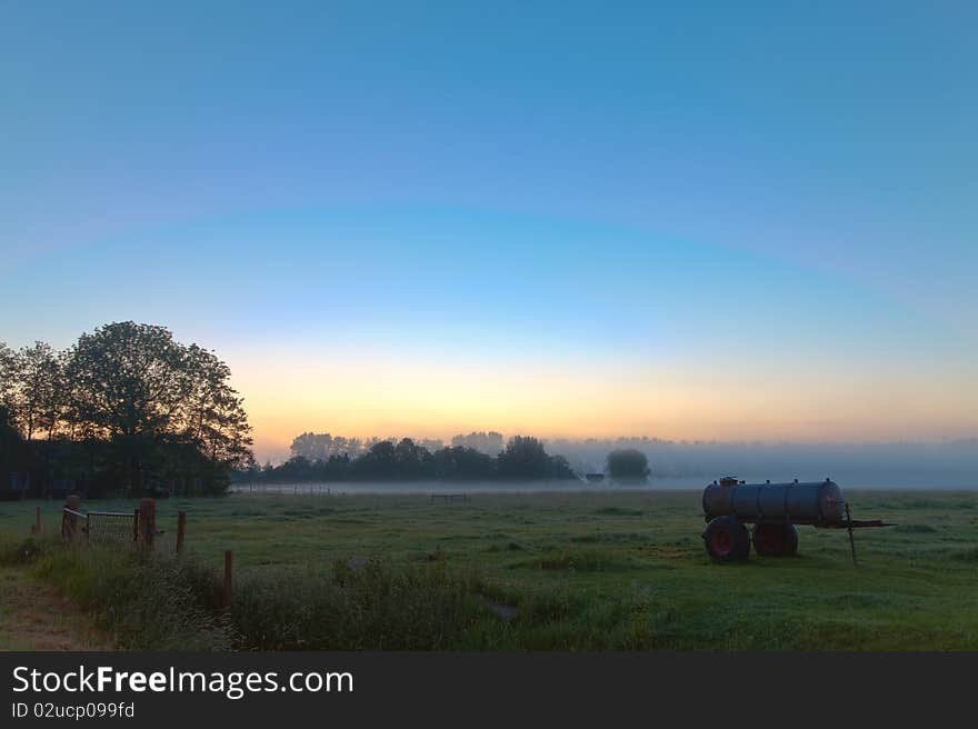 Sunrise in the countryside with morning mist