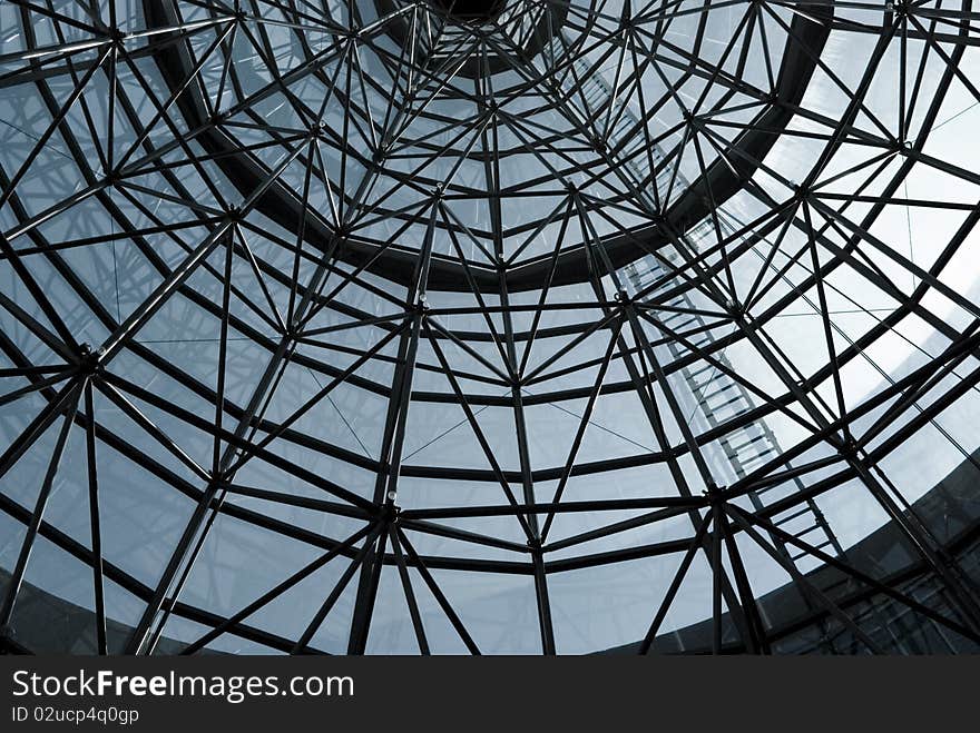 The skeletal construction of a glass cone roof. Singapore. The skeletal construction of a glass cone roof. Singapore