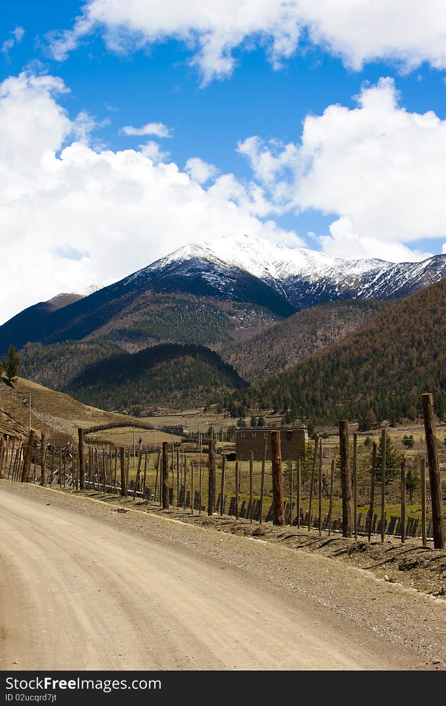 Mountain road in blue sky