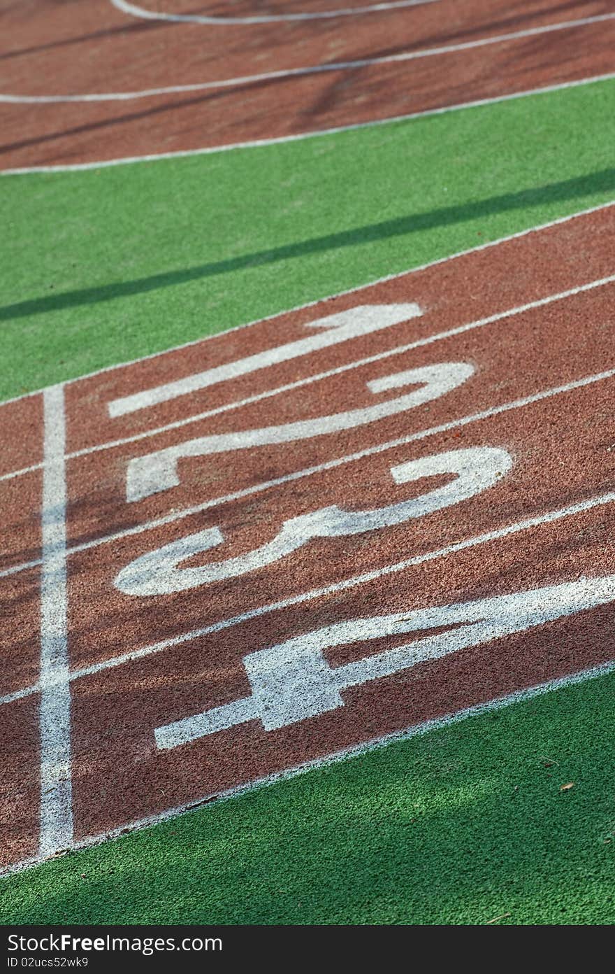 Running track lines in sunshine.