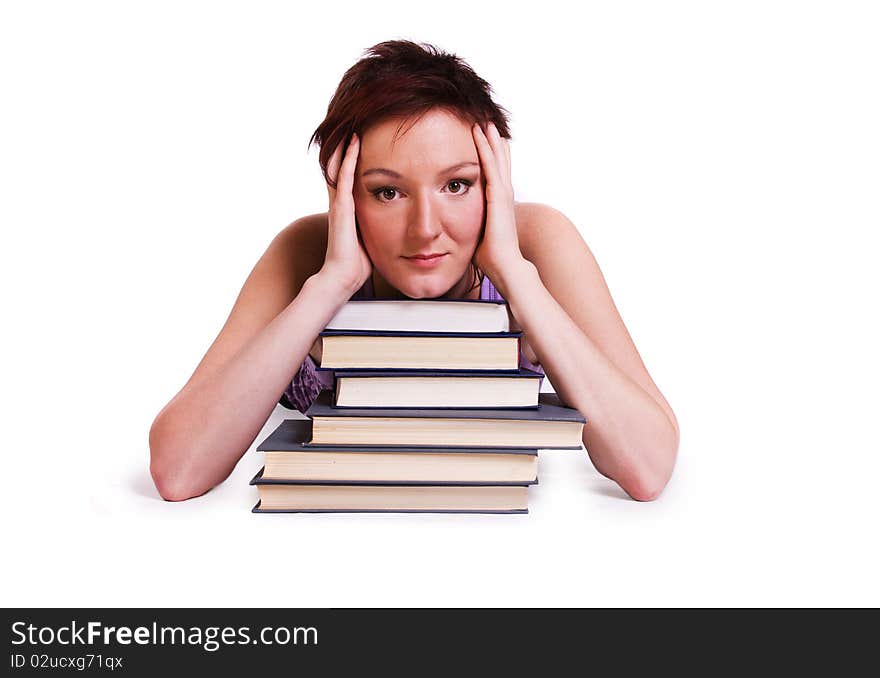 Senior high school student in uniform with documents is laying on the stack of book. Senior high school student in uniform with documents is laying on the stack of book.