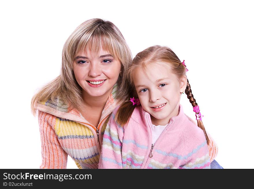 Happy family - mother and little daughter are embracing. Happy family - mother and little daughter are embracing.