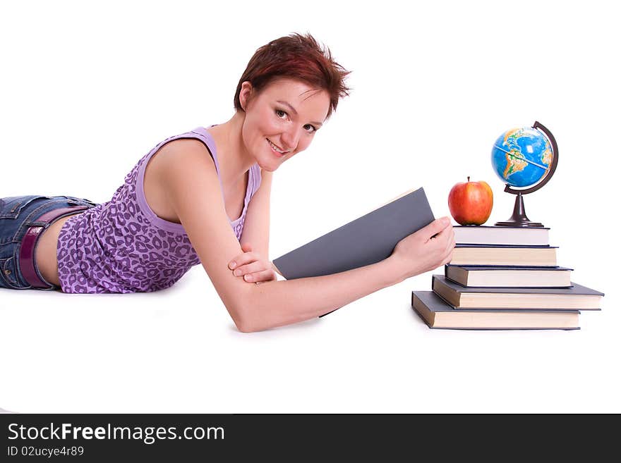 Girl doing her homework. Studying cheerful young woman reading her book for school. Woman with books. Girl doing her homework. Studying cheerful young woman reading her book for school. Woman with books