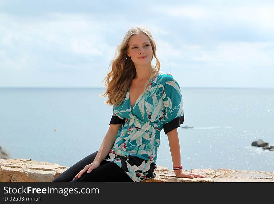 Portrait of a smiling girl on top of the building in Spain. Portrait of a smiling girl on top of the building in Spain.