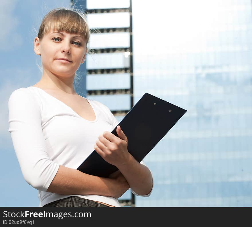 Beauty business woman on modern glass building