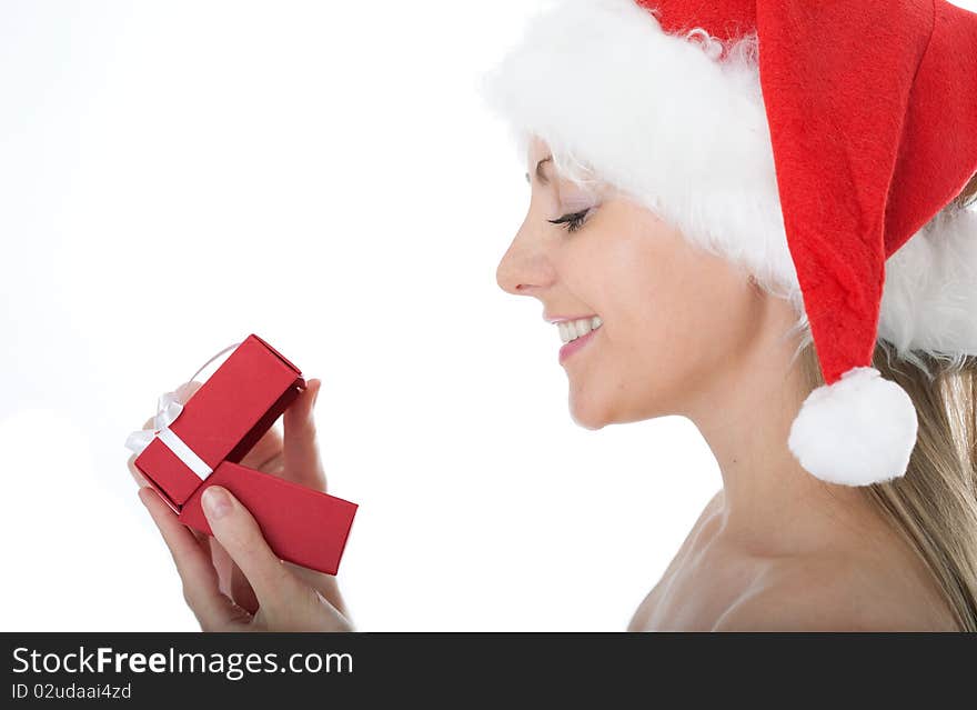 Beauty woman in  Santa hat with present isolated on white