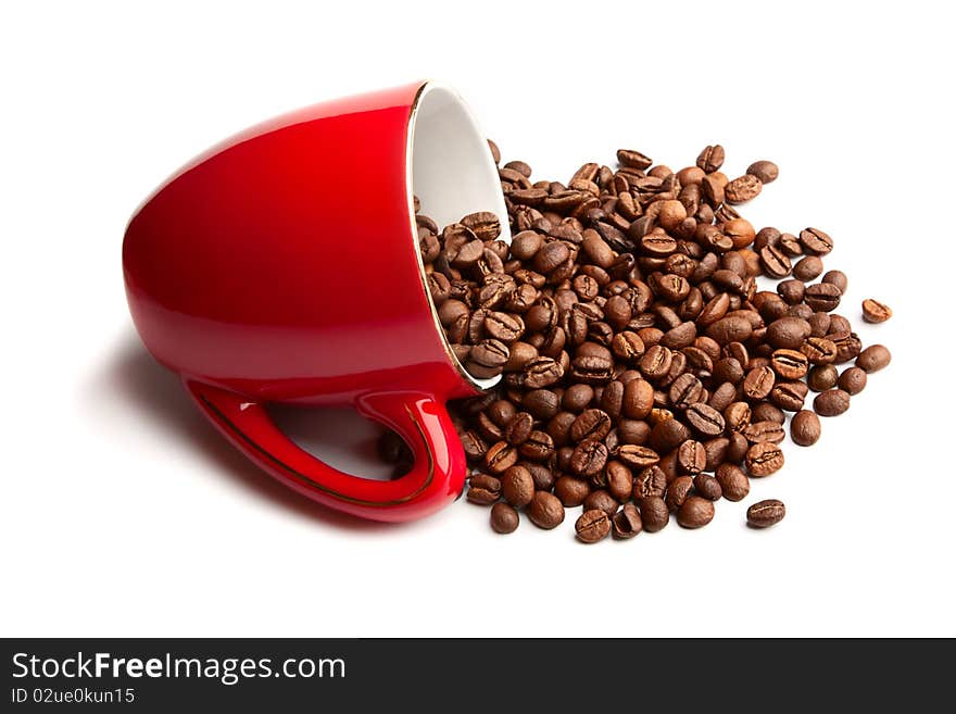 Cup with grain coffee isolated on white background