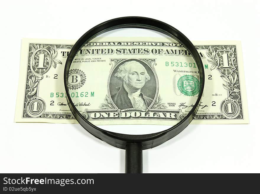 US dollar with magnifying glass