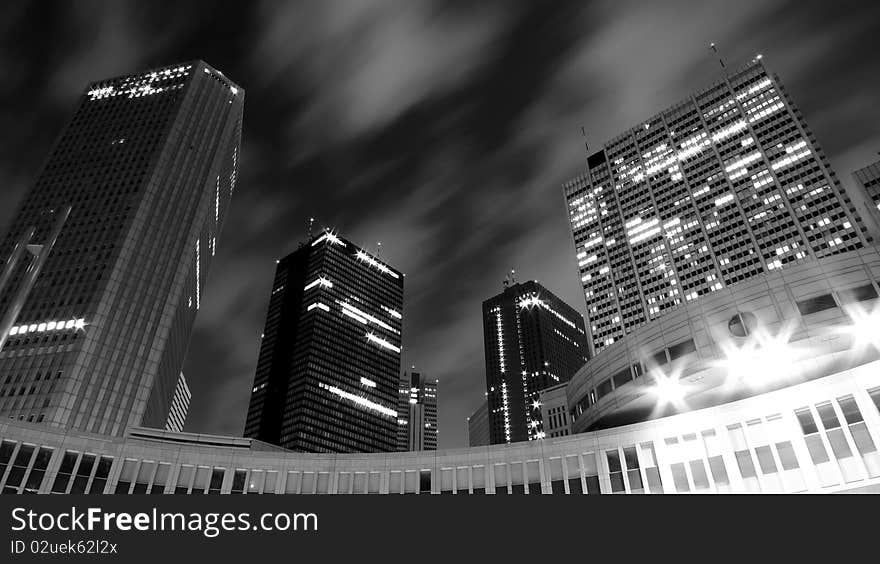 Modern buildings in West Shinjuku, Tokyo at night. Modern buildings in West Shinjuku, Tokyo at night.