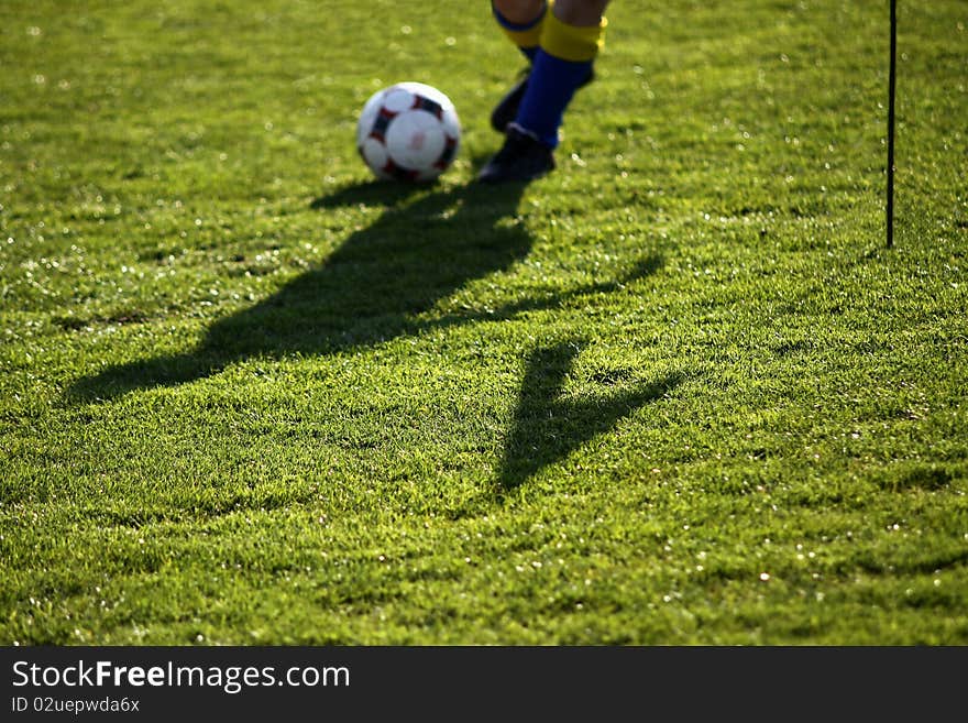 Soccer player putting foot on ball. Soccer player putting foot on ball