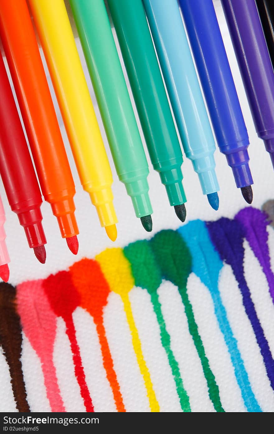 Colorful markers on white background. With beautiful vibrant colors, great for kids, color, school , design or print themes. Colorful markers on white background. With beautiful vibrant colors, great for kids, color, school , design or print themes.