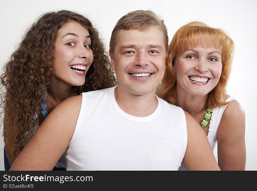 Happy family, parents with their grown-up daughter.