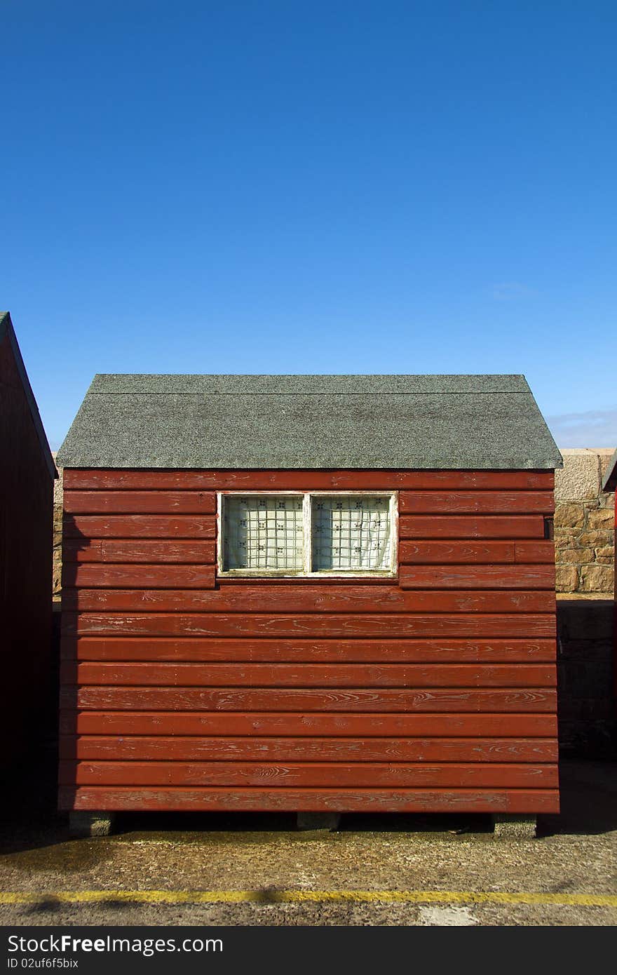 Red hut, blue sky