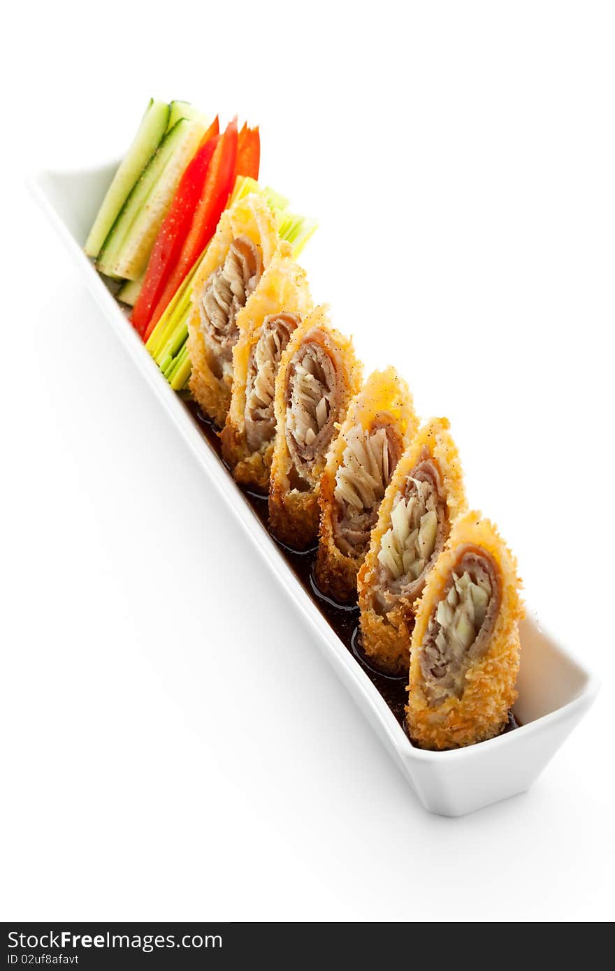 Deep Fried Pork Roll with Vegetables and Sauce. Deep Fried Pork Roll with Vegetables and Sauce