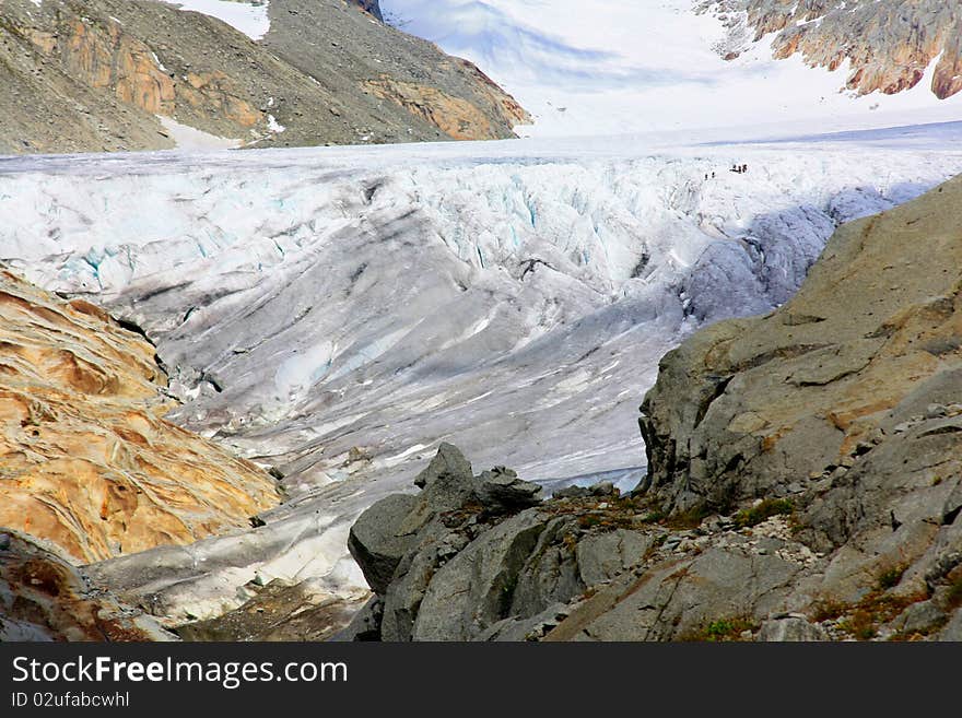 Glacier With Snow Capped Mountains