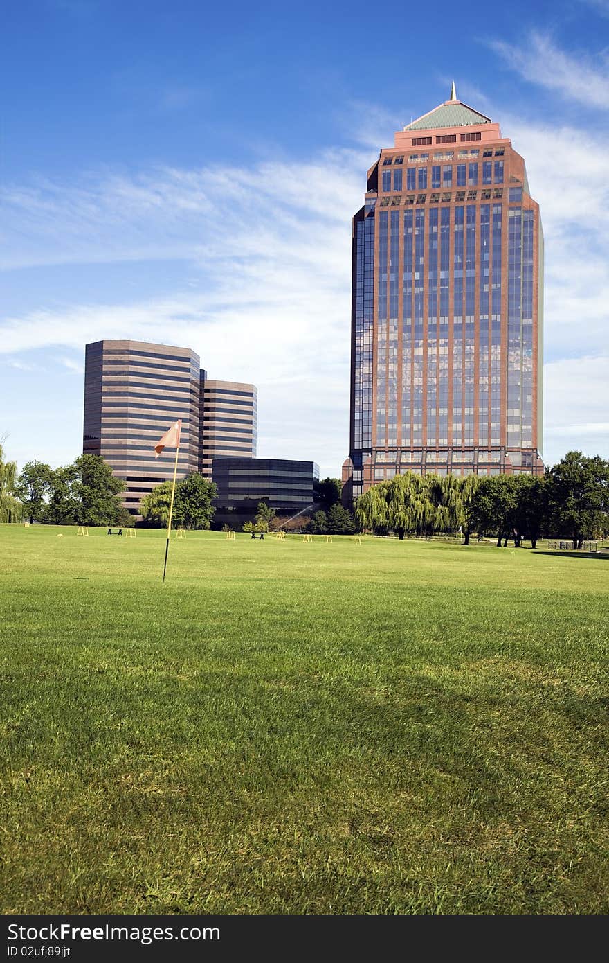 Golf Course in front of skyscrapers