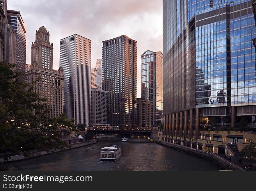 Sunset by Chicago River in downtown Chicago. Sunset by Chicago River in downtown Chicago.