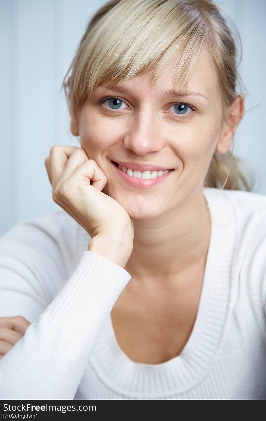 Portrait of a beautiful young successful businesswoman in white