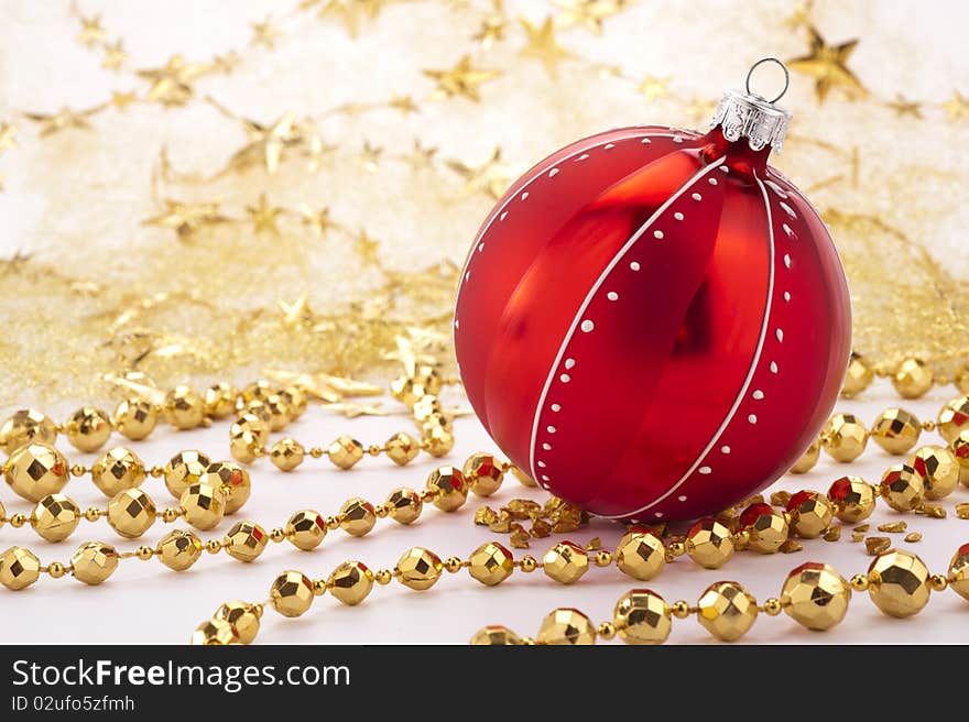 Christmas decoration with red ball and golden stars