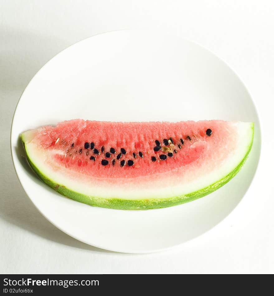 Watermelon on white plate