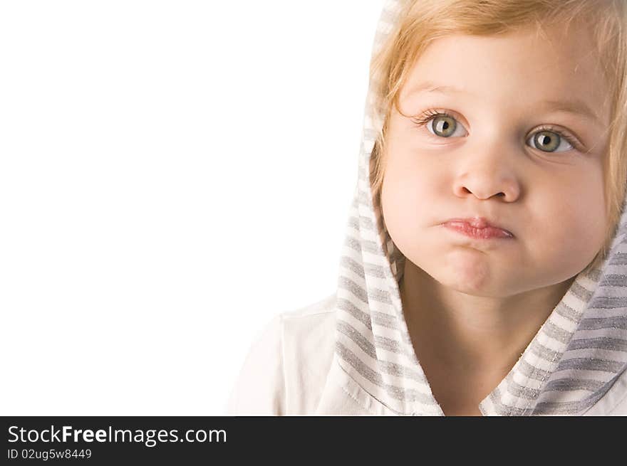 Little cute girl making a funny face close-up on white background