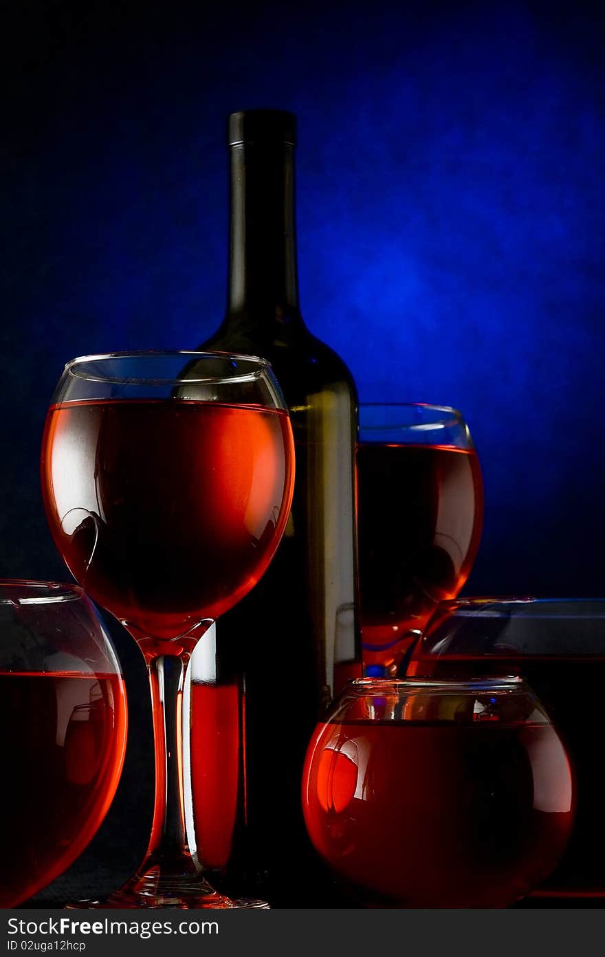 Red wine on the black background