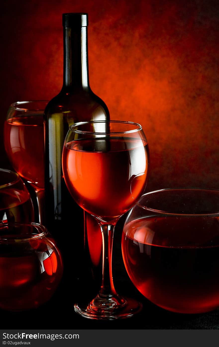 Red wine on the black background