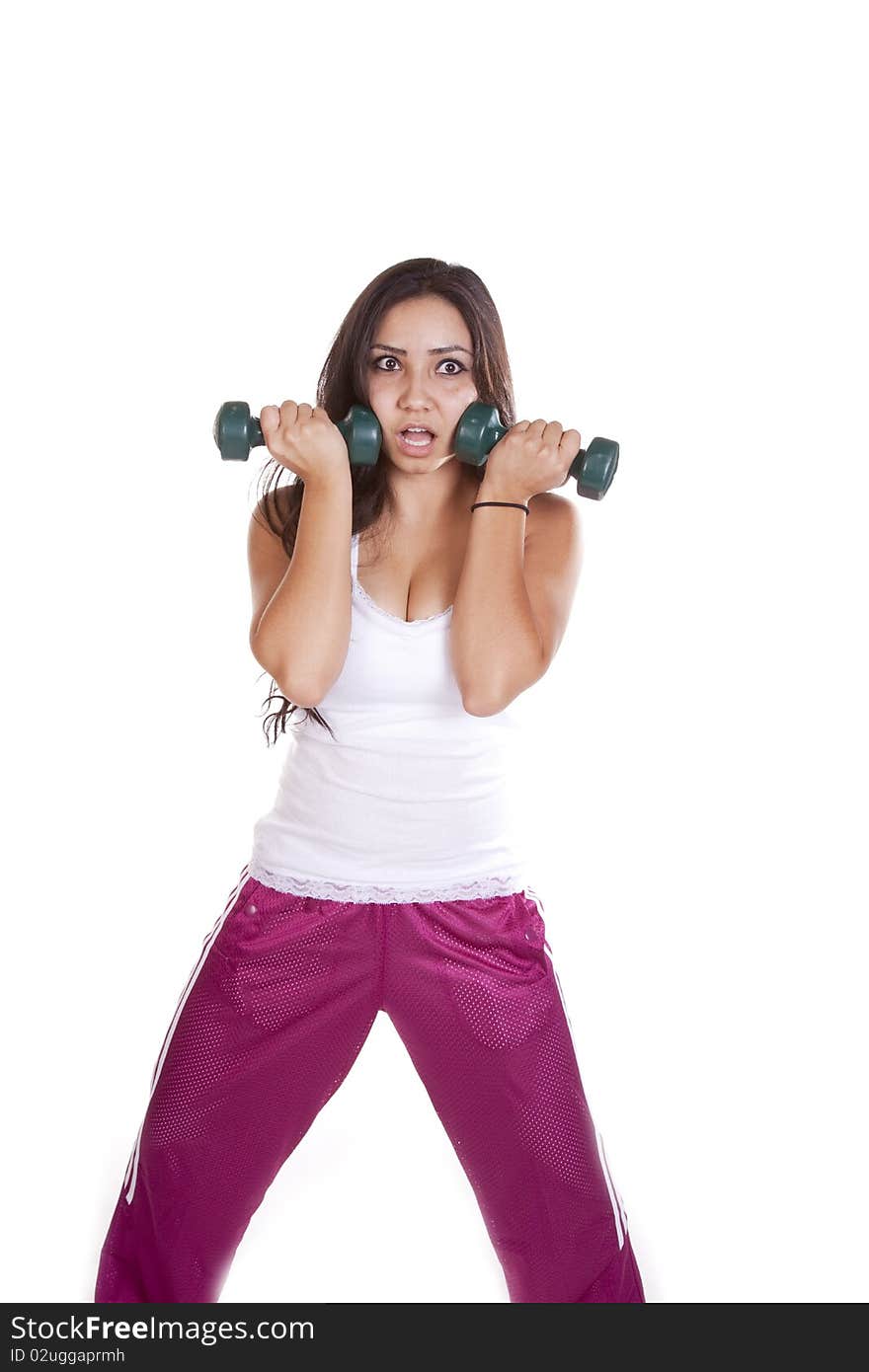 Woman with weights looking stunned