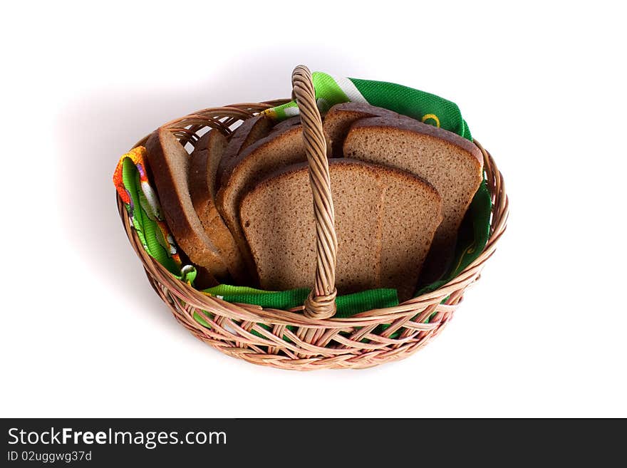 Basket with bread isolated on white background