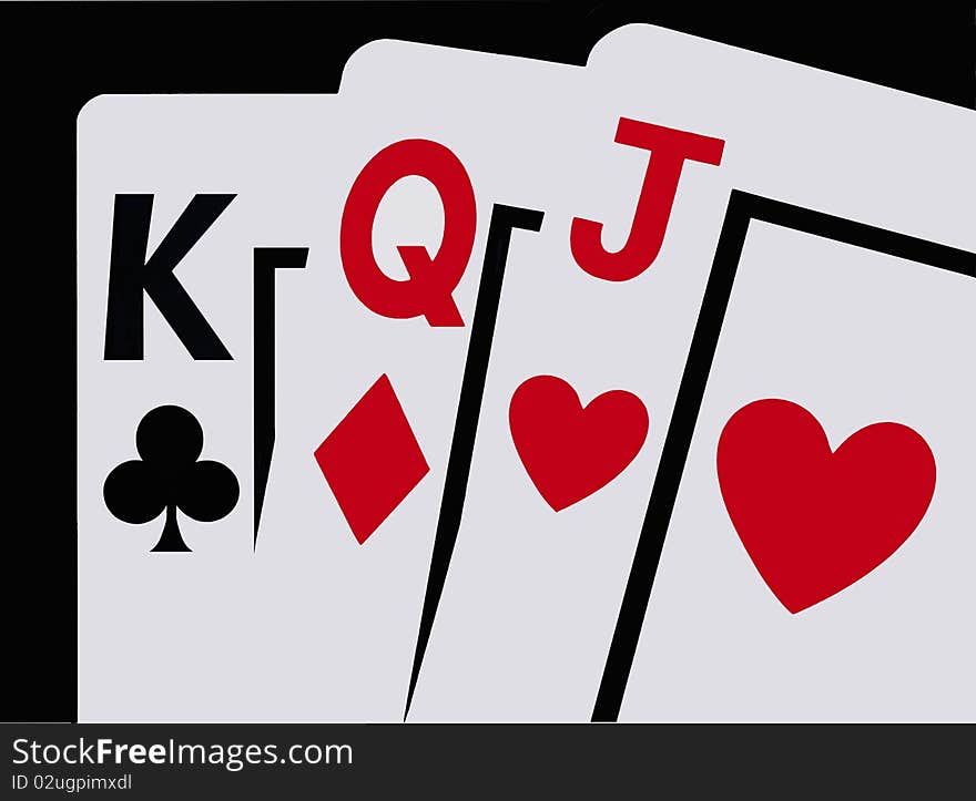 A closeup of three playing cards, a King, Queen and Jack against a clean black background. A closeup of three playing cards, a King, Queen and Jack against a clean black background