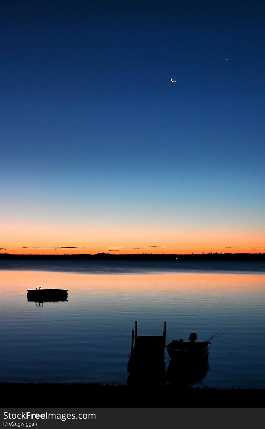 A beautiful sunrise spectacle in the Graham Lake, ME. A beautiful sunrise spectacle in the Graham Lake, ME