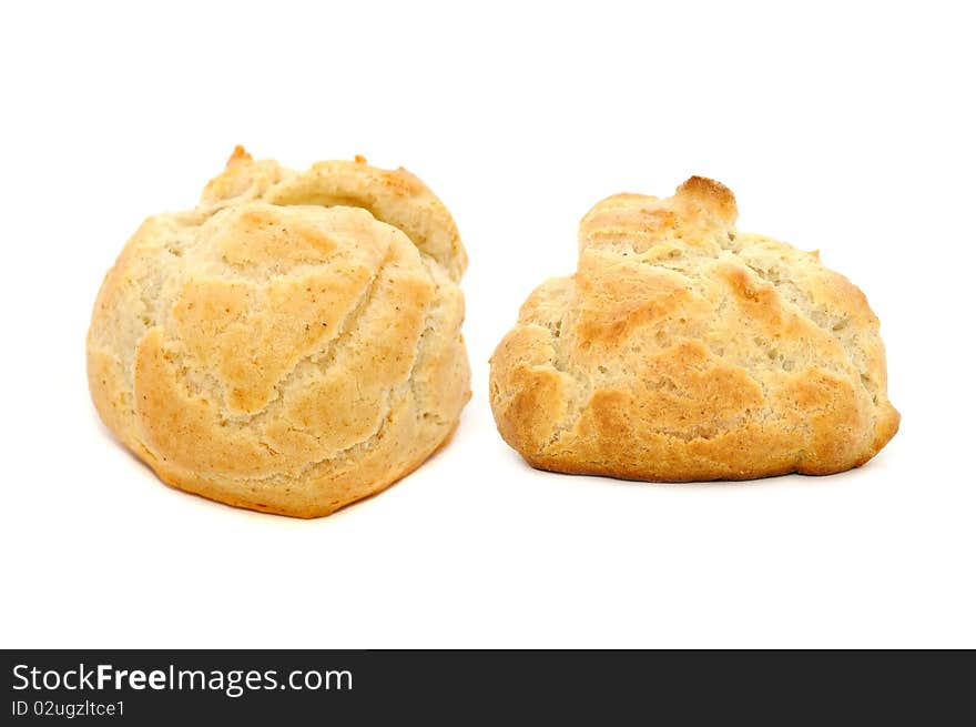 A set of fresh-baked homemade buns isolated on a white background. A set of fresh-baked homemade buns isolated on a white background