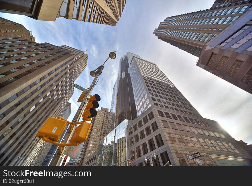 Skyscrapers and trafficlights in  new york city. Skyscrapers and trafficlights in  new york city