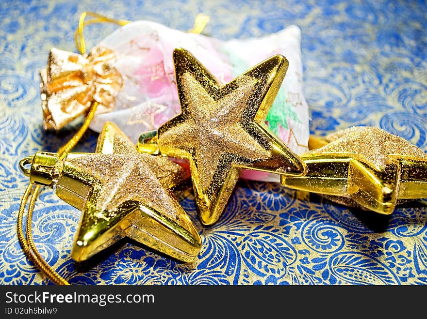 Christmas toys and present on the colorful background