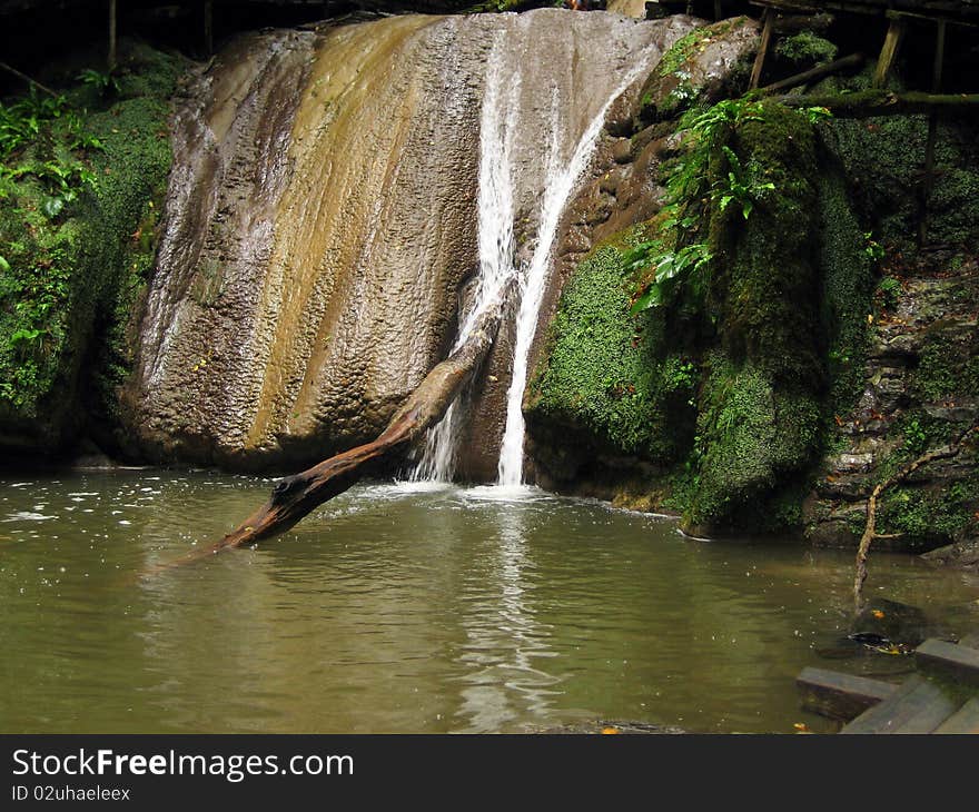 Waterfall in a mountain forest relict