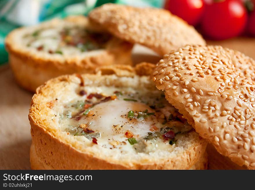 Eggs baked in bread rolls. Eggs baked in bread rolls