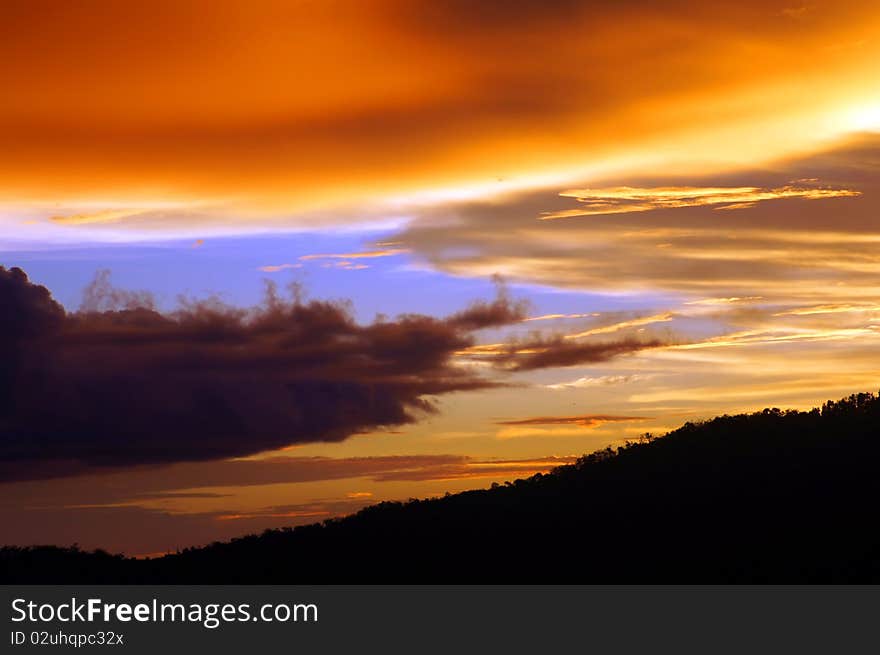 Clouds and sky at sunset for backgrounds