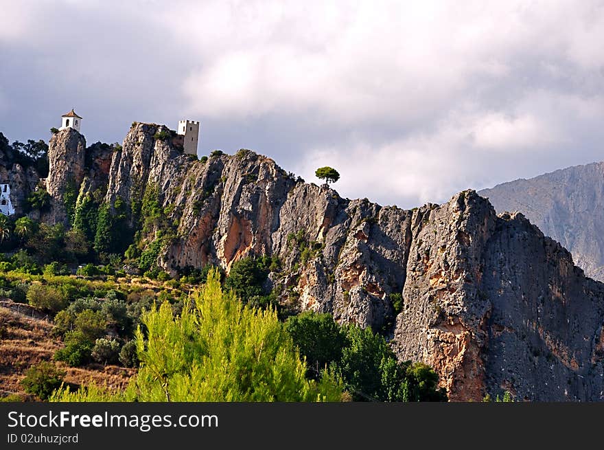 Spain Guadalest mountain sun sky ridge protrusion landscape painting Village