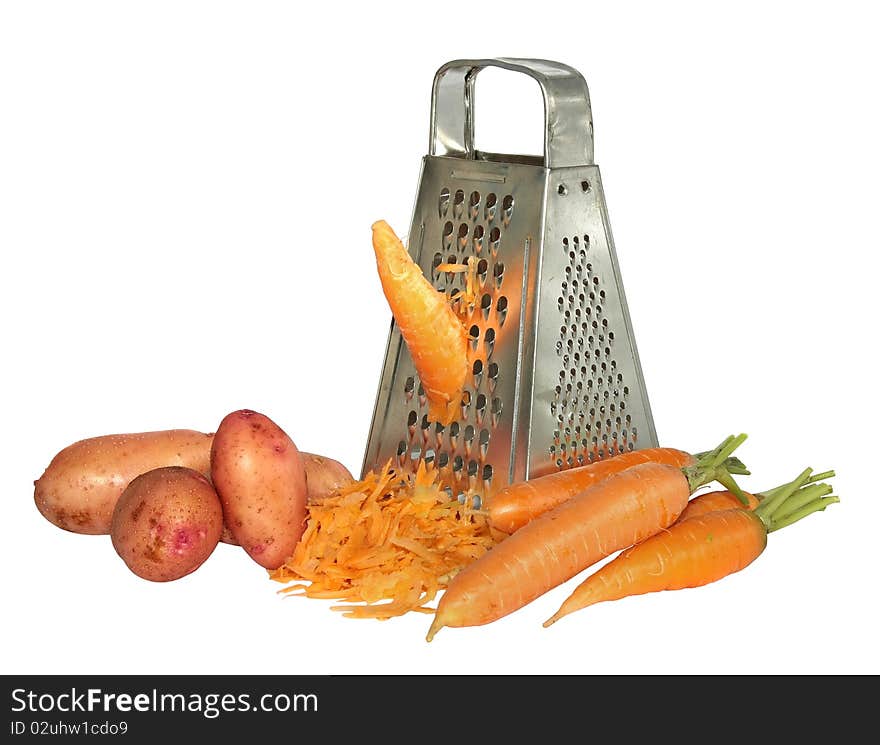 Fresh carrots rubbed on a kitchen grater