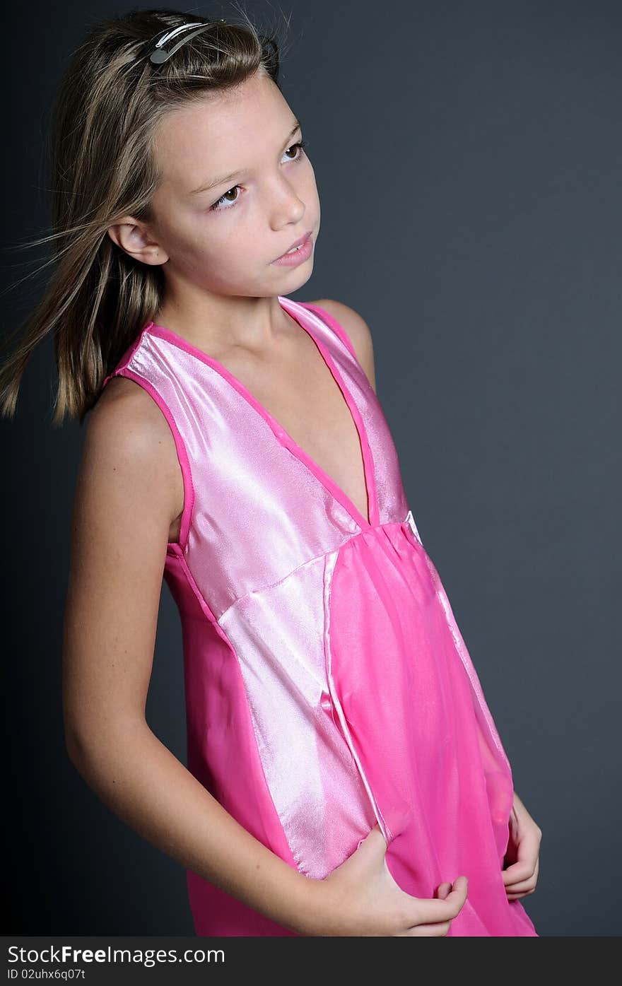 Happy girl posing in studio. Happy girl posing in studio