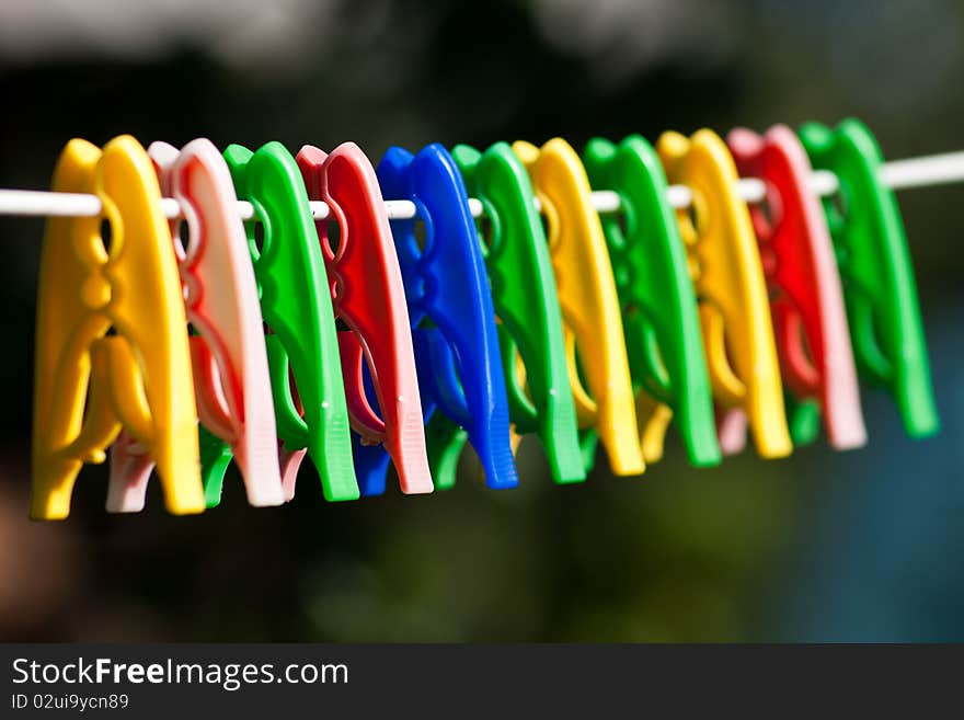 Group of colored clothes pegs