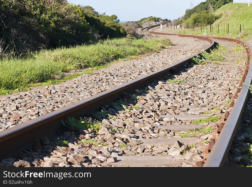 Old train tracks making an S shape.