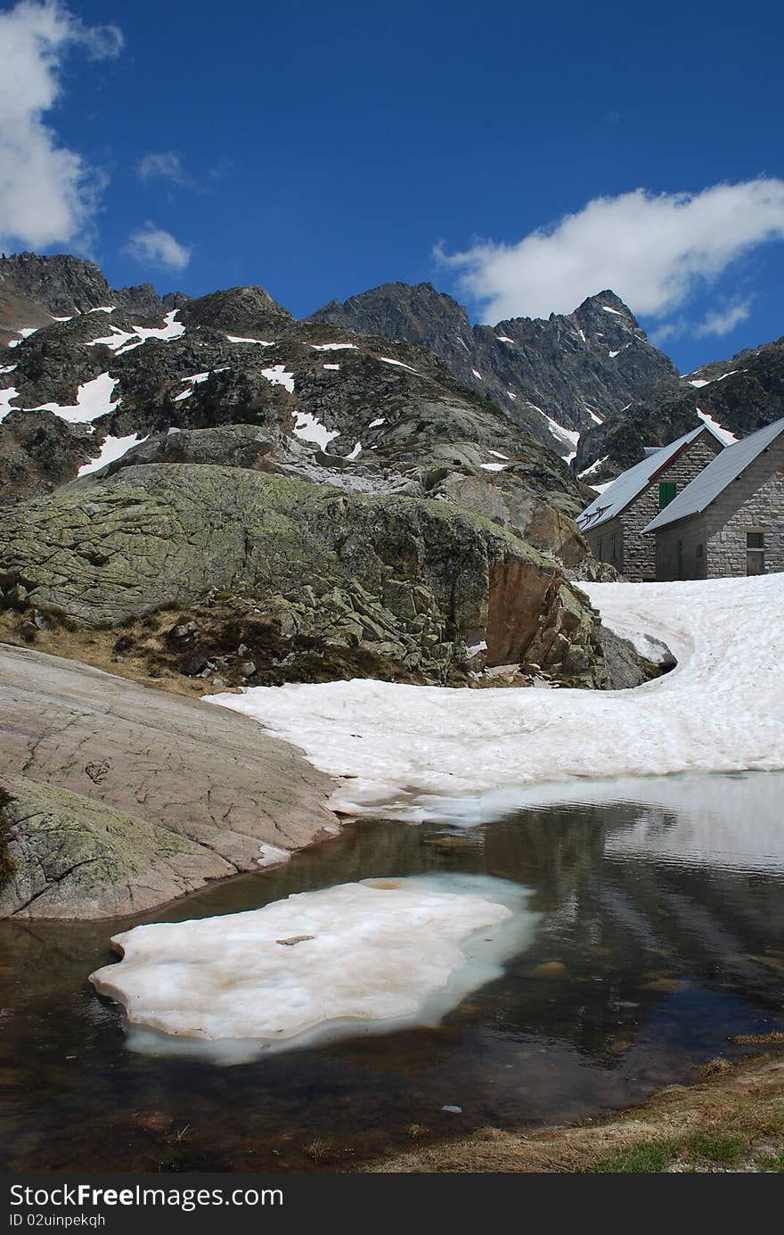 Refuges in the border of Artouste lake, situatad at 1997 m, it is a border of Atlantic and Hight Pyrenees.  its the end of spring, the snow is melting